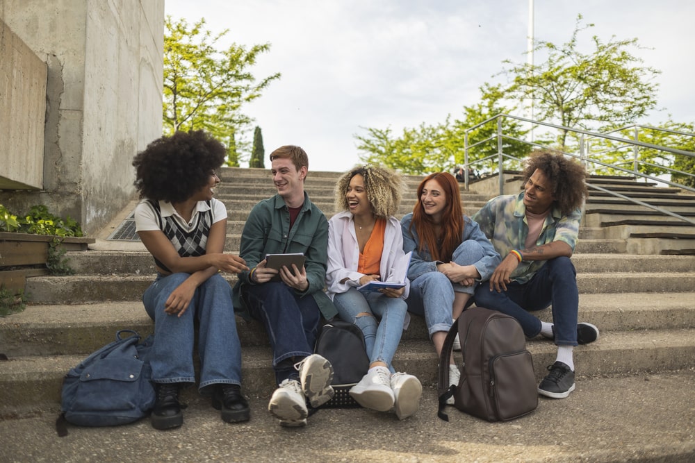 Advantage Stone Fabrication, Berthoud Colorado High schools, students sitting on steps