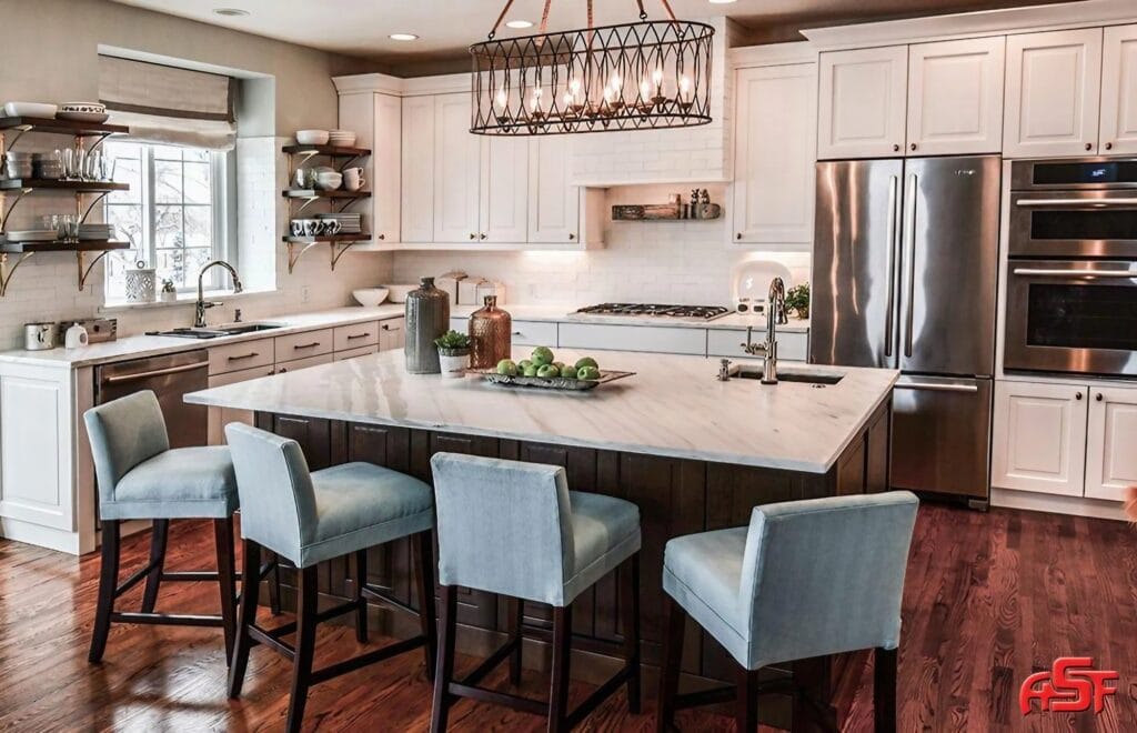 A modern kitchen featuring polished marble custom countertops by Advantage Stone. The large central island and surrounding counters showcase the craftsmanship, with a honed finish that highlights the natural beauty of the stone. The countertops provide a luxurious and functional surface that complements the overall design of the space, emphasizing Advantage Stone's expertise in custom counter solutions.