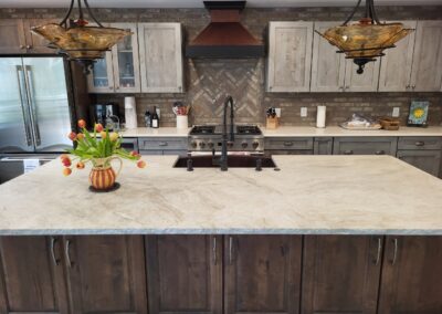 Image of caesarstone. Have you ever dreamt of having stunning quartz countertops and slabs for your kitchen or bathroom, but were discouraged by the high cost and limited options available in the market? It's frustrating to settle for less when it comes to the most important spaces in your home. Outdated countertops can make your kitchen look drab, while dull bathroom surfaces can take away from the overall aesthetics of your home. Introducing Advantage Stone Fabrication, your one-stop solution for exquisite quartz countertops and slabs. We offer a wide range of options that are not only affordable but also customizable to suit your unique style and preferences. With Advantage Stone Fabrication, you can transform your kitchen or bathroom into a luxurious space that reflects your personal taste. Our expert craftsmen ensure precision fabrication and installation, guaranteeing a flawless finish that will leave you in awe. Don't settle for mediocre when you can have exceptional. Upgrade your home with Advantage Stone Fabrication's quartz countertops and slabs today!