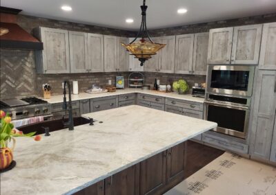 Image of caesarstone quartzite. Have you ever dreamt of having stunning quartz countertops and slabs for your kitchen or bathroom, but were discouraged by the high cost and limited options available in the market? It's frustrating to settle for less when it comes to the most important spaces in your home. Outdated countertops can make your kitchen look drab, while dull bathroom surfaces can take away from the overall aesthetics of your home. Introducing Advantage Stone Fabrication, your one-stop solution for exquisite quartz countertops and slabs. We offer a wide range of options that are not only affordable but also customizable to suit your unique style and preferences. With Advantage Stone Fabrication, you can transform your kitchen or bathroom into a luxurious space that reflects your personal taste. Our expert craftsmen ensure precision fabrication and installation, guaranteeing a flawless finish that will leave you in awe. Don't settle for mediocre when you can have exceptional. Upgrade your home with Advantage Stone Fabrication's quartz countertops and slabs today!