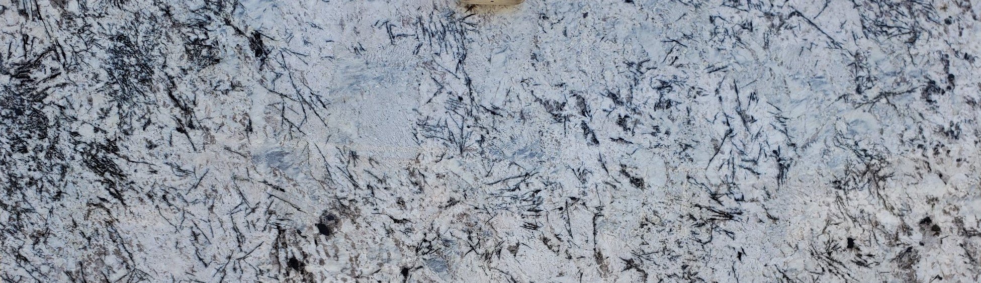 Image of granite slab crystal blue for custom countertops in Longmont. Outdated and worn-out countertops can make your kitchen and bathroom look dull and unattractive. Finding high-quality granite countertops and slabs that fit your budget can be a daunting task. Imagine the frustration of spending hours searching for the perfect granite countertops, only to find limited options or exorbitant prices. Your dream of having a luxurious, durable, and visually stunning countertop seems out of reach. Introducing Advantage Stone Fabrication, your ultimate solution for granite countertops and slabs. We offer a wide selection of premium quality granite that adds elegance and sophistication to your space. With our expertise in stone fabrication, we provide custom solutions that perfectly fit your needs and budget. Experience the advantage of working with us - impeccable craftsmanship, exceptional customer service, and competitive pricing. Upgrade your kitchen or bathroom with our exquisite granite countertops and slabs today!